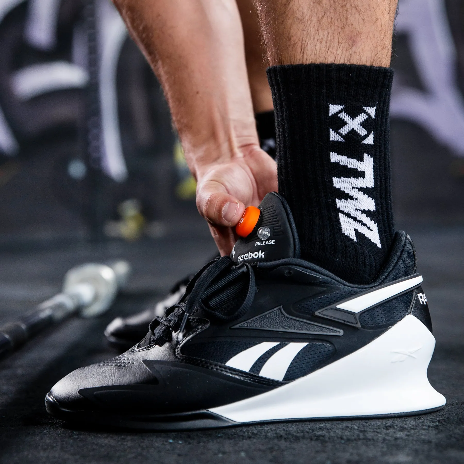 REEBOK - LEGACY LIFTER III - CORE BLACK/FTWR WHITE/SMASH ORANGE
